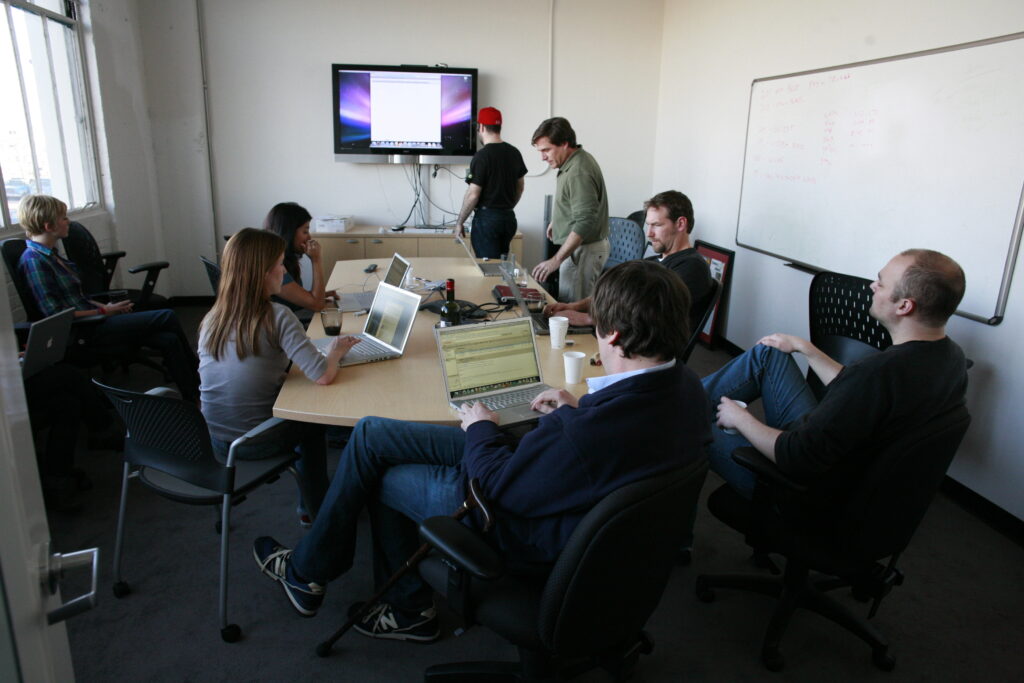 Staff meeting, photo via Wikimedia Commons