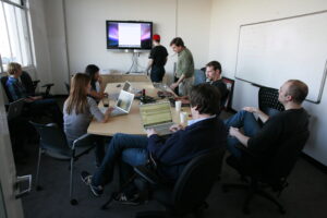 Staff meeting, photo via Wikimedia Commons